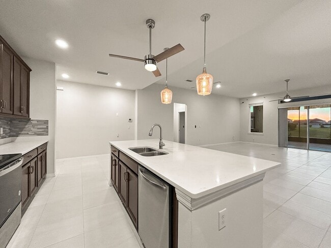 Building Photo - $1,500 OFF on Your 2nd Month’s Rent! Riverview Gem – 4BR/2BA Home with Screened-In Hot Tub & Solar!!