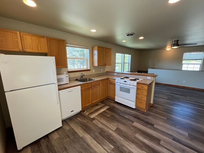 Building Photo - Nicely Update Home in Great Location with Hot Tub Care Included