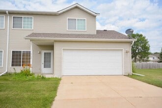 Building Photo - Hard to find end unit townhome with 2 car garage!