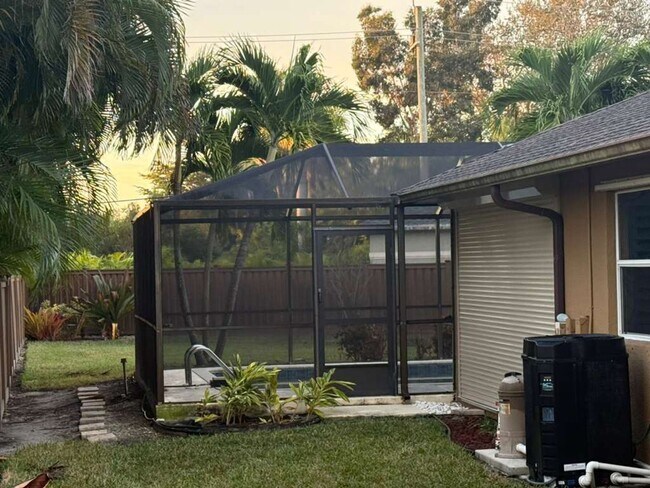 Building Photo - 4BR / 2BA Pool Home Near the Beach – Bonita Springs, FL