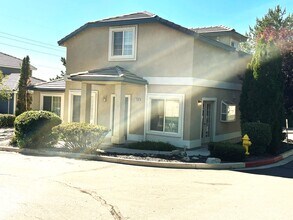 Building Photo - Cute 3 bedroom, 2.5 bath two story home with 1448 sq ft of living space