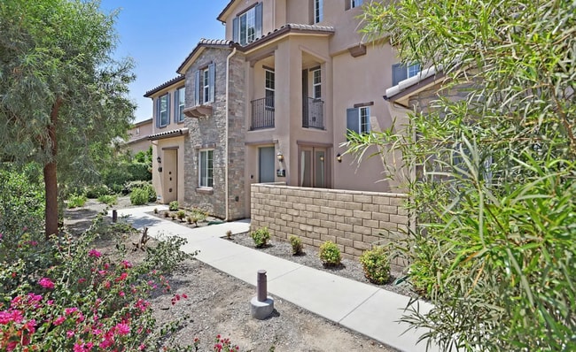 Building Photo - This gorgeous 3-bedroom, 3.5 bath townhome...