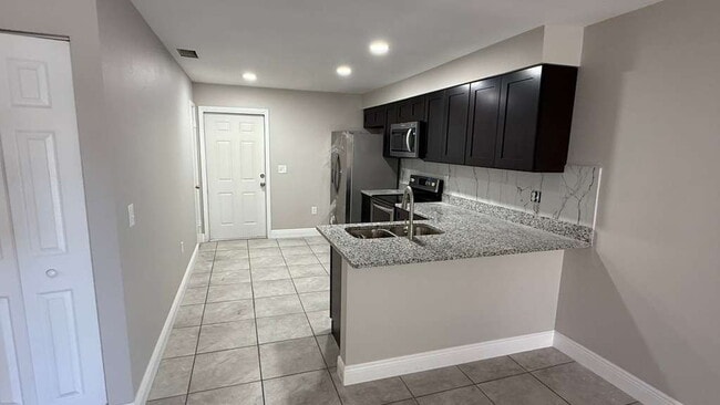 Building Photo - 979 BERKLEY ROAD Unit #3, AUBURNDALE, Florida 33823