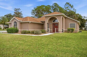 Building Photo - "Charming 3-Bedroom Home with 2 Full Baths and 2032 Sq Ft of Comfort in Palm Coast!"