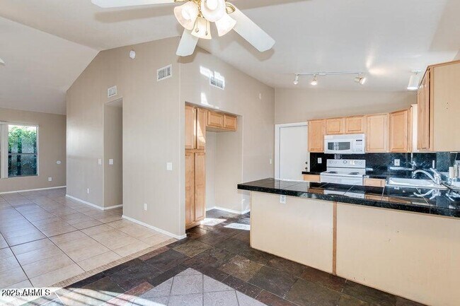 Building Photo - 9346 E Plana Ave