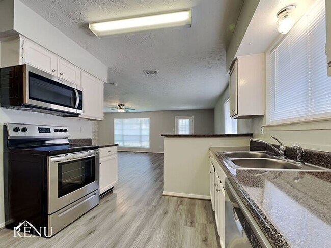 Building Photo - 6918 Rockergate Dr