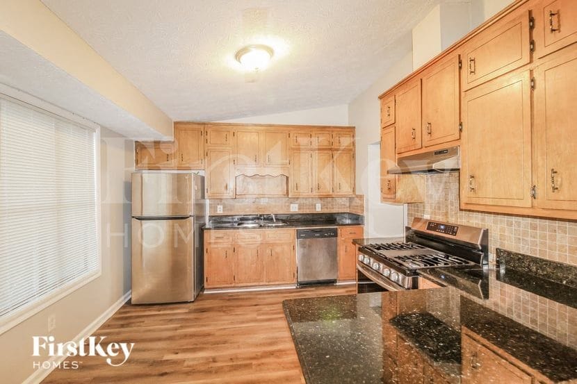 Building Photo - 634 Woodsong Ln