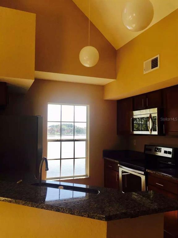 Building Photo - 9020 Lake Chase Island Way