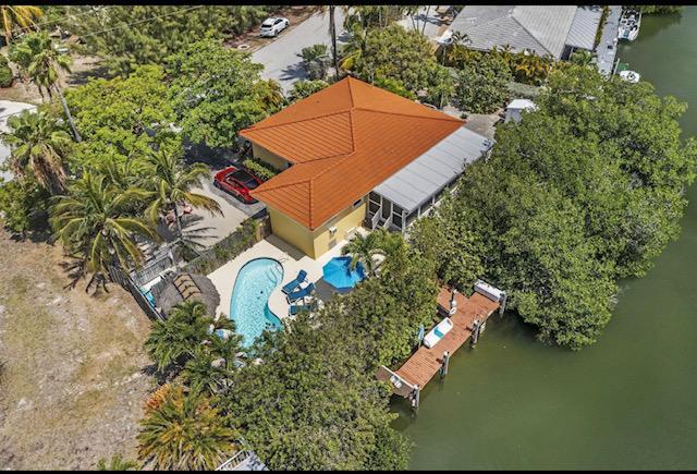 Aerial of home with dock. Minutes to Atlantic - 309 Calzada de Bougainville