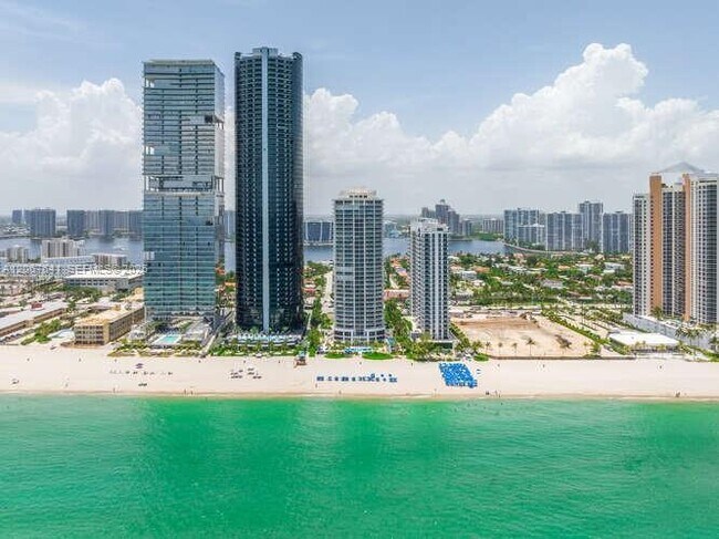Building Photo - 18671 Collins Ave