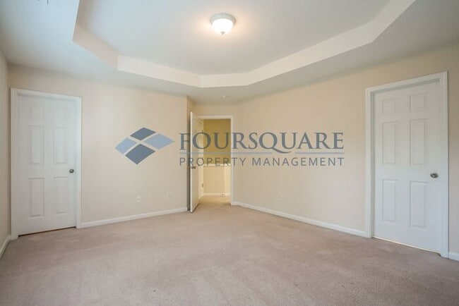 Building Photo - Townhome! | Back Patio with Privacy Fence|...