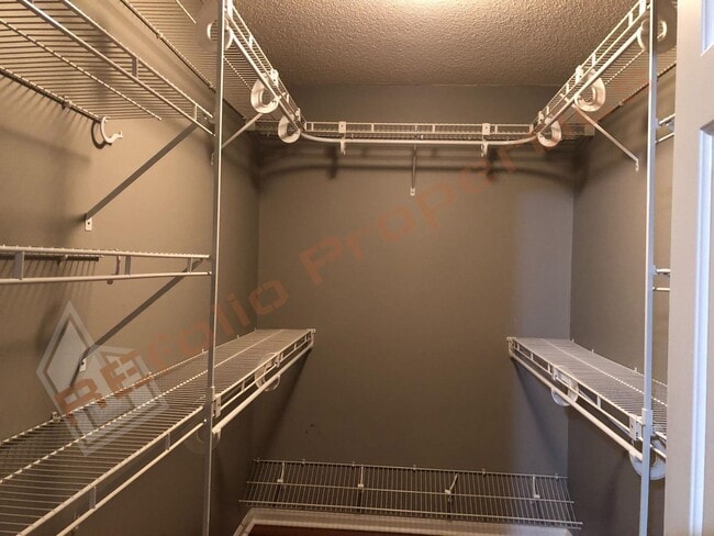 Building Photo - Elegant 4 Bedroom 2.5 Bath House w/ Primary Suite on 1st Floor + a Fenced-in Backyard @ Park Vill...