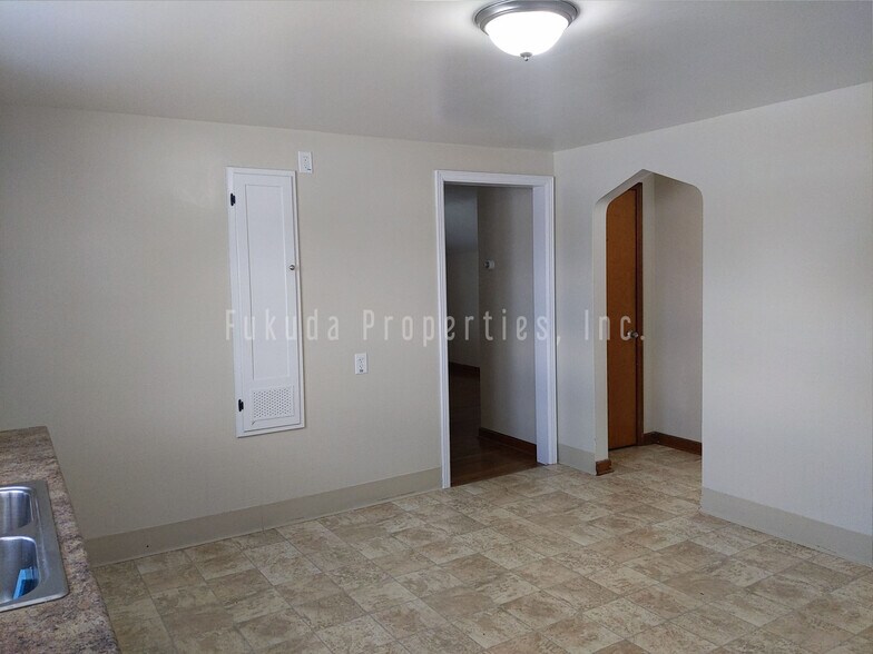 Hallway and living room off of kitchen - 2490 Forest Ave