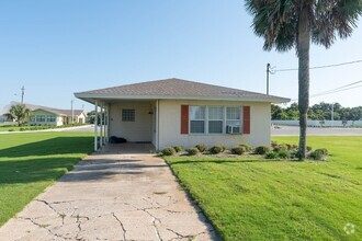 Building Photo - Cute Two-Bedroom Steps from the Sand!