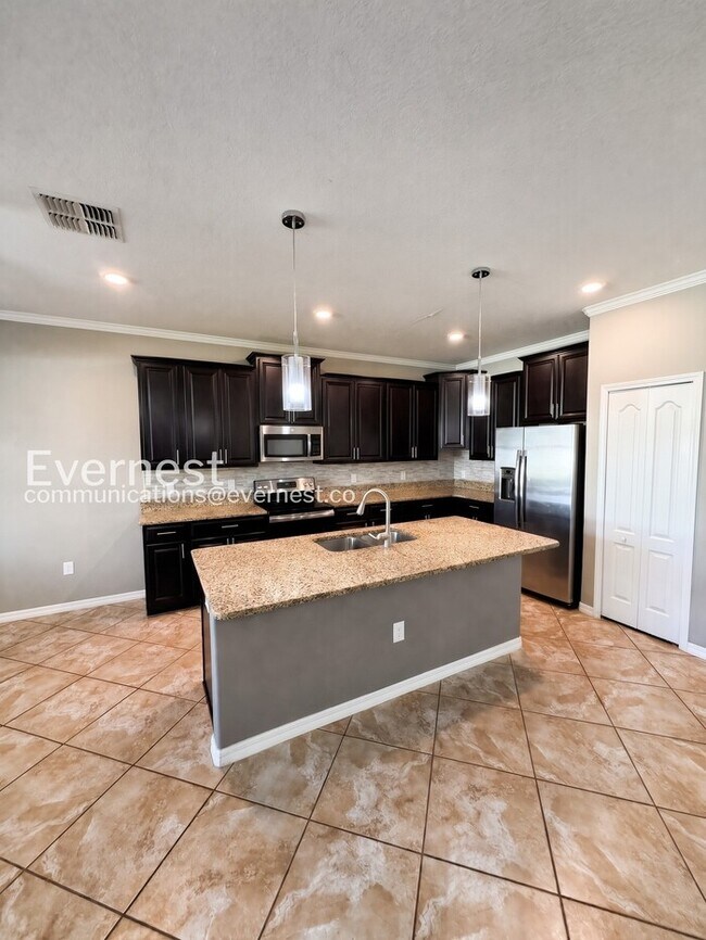 Building Photo - 4 Bed & 3 Bath Home with Fenced Yard and Modern Amenities / Voucher Accepted / No Pets Allowed / ...