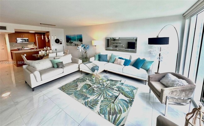 Building Photo - 10275 Collins Ave