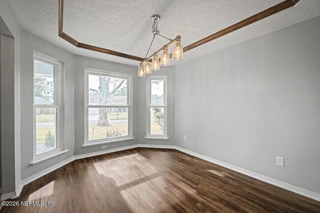 Building Photo - 8472 Bandera Cir W