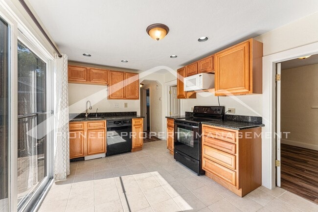 Building Photo - Spacious Bungalow with Private Backyard Near Sloan's Lake Neighborhood!