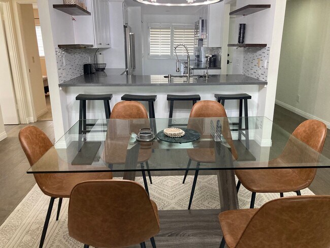 Building Photo - Beachside Furnished Retreat! Remodeled 2BD/2BA Condo Steps from the Sand!