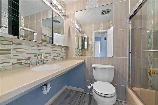 Building Photo - "Spacious 5-Bed Home with Granite Accents ...