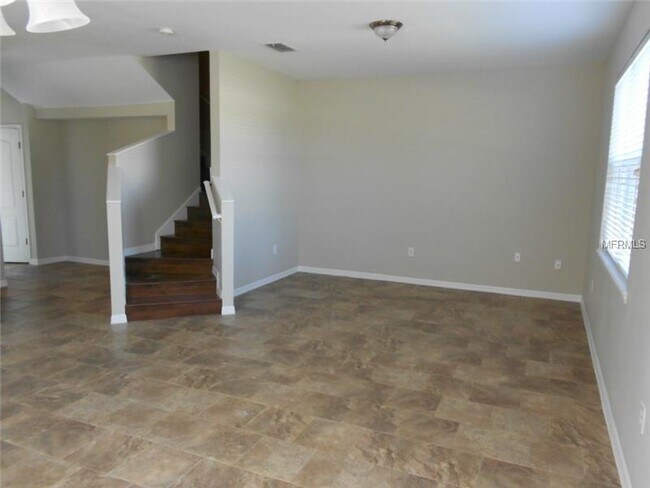Building Photo - MOVE IN SPECIAL-3/2.5 Spacious Townhouse w/ 2 Car Garage in St. Cloud