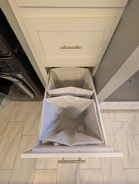 Built in laundry hampers - 8701 NW 116th St