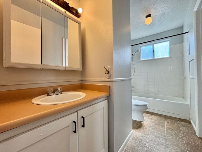 Building Photo - Cozy Home with New Paint & Flooring!