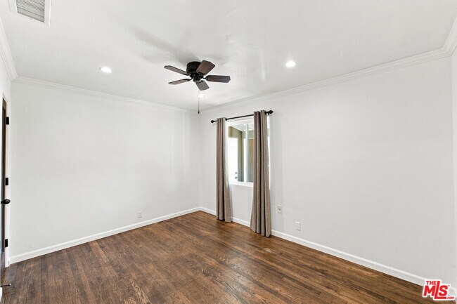 Building Photo - 4415 Woodland Ave