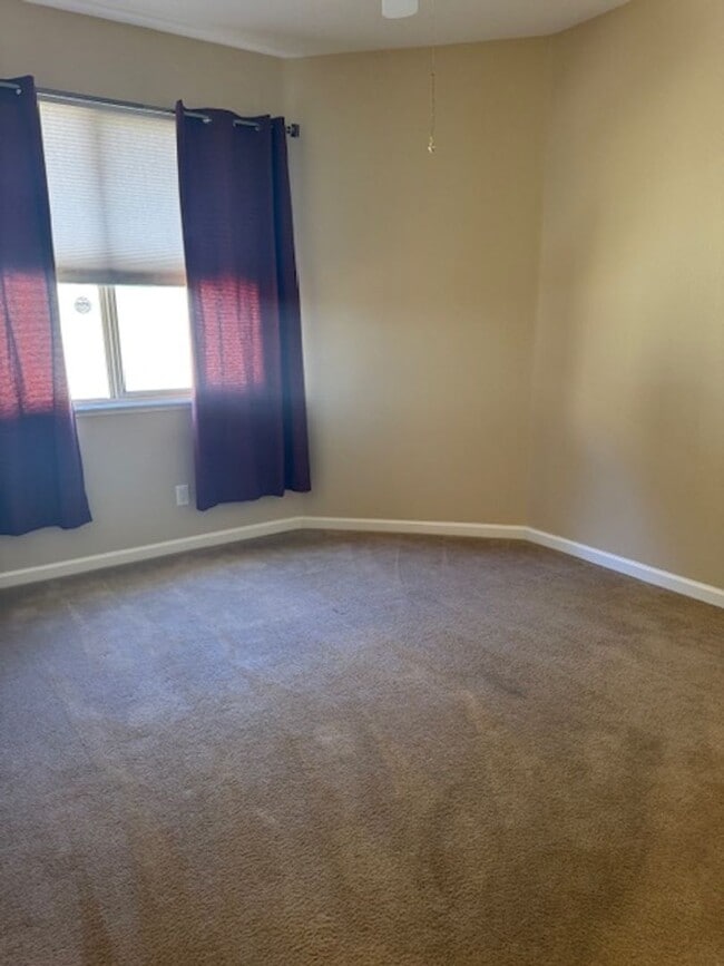 Building Photo - Located in a Quiet, Gated Community in Car...
