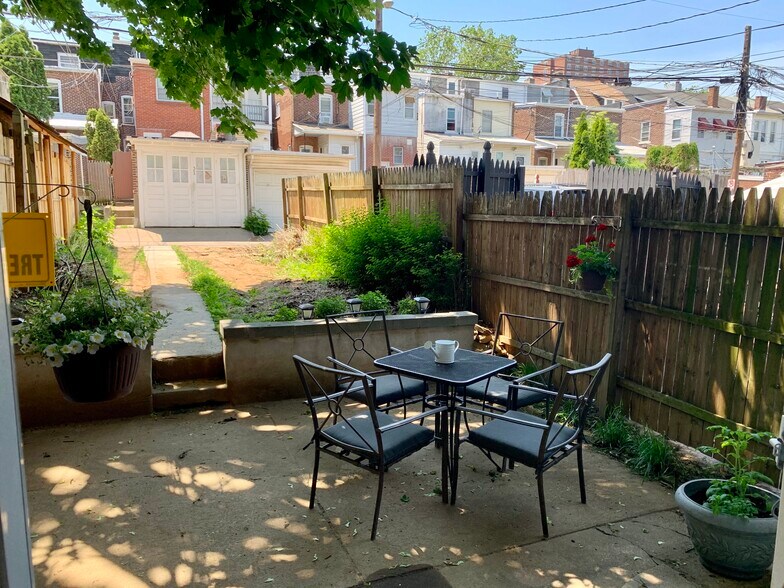 Outdoor living space & off-street parking spot - 228 S Madison St