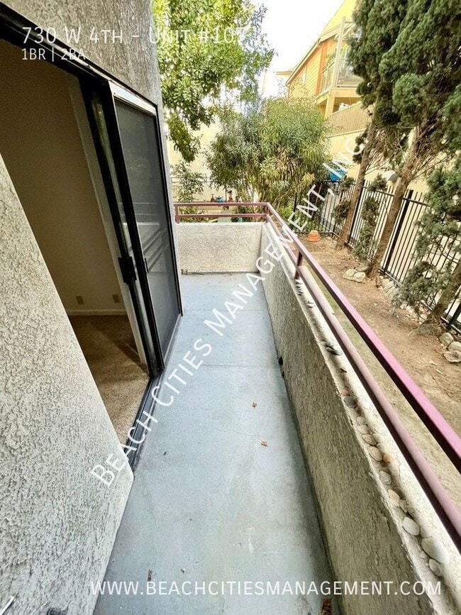 Building Photo - 730 W 4th-Unit #107