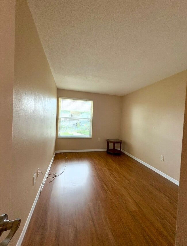 Building Photo - Beautifully Updated Condo in a Gated Activ...