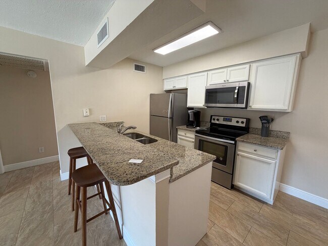 Building Photo - ANNUAL RENTAL - FURNISHED 1 BED / 1 BATH CONDO AT MYSTIC GARDEN