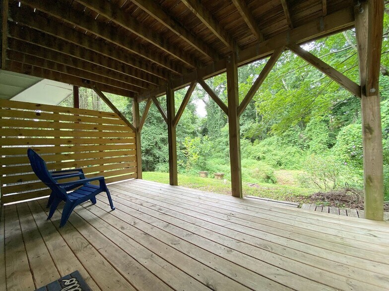 View of the backyard from your porch in the summer. - 173 State St