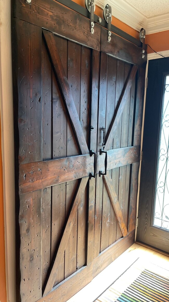Custom barn doors for laundry - 229 Quail Run