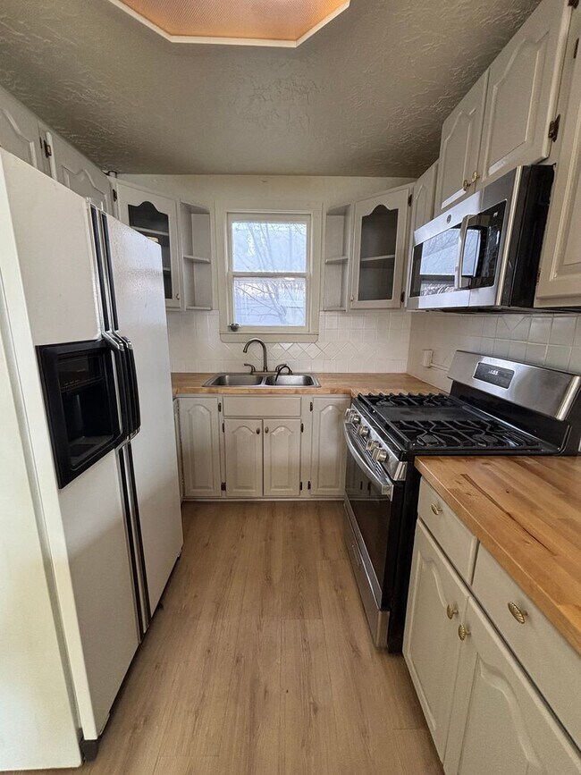 Building Photo - Spacious & Updated 5 Bed Home in Prime Ogden Location