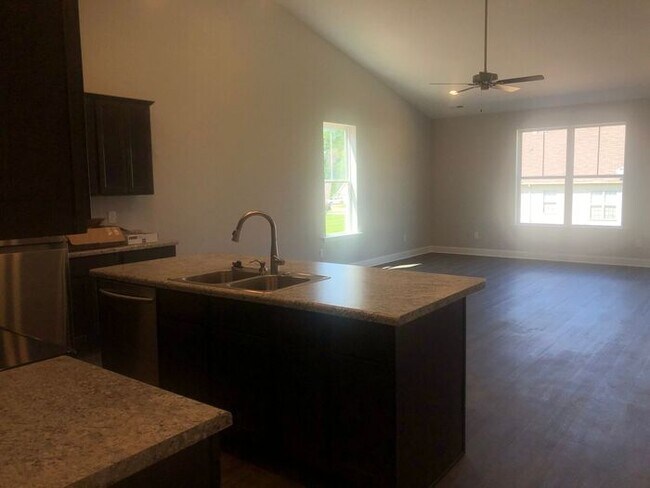 Building Photo - Discover the Ultimate in Modern Living!
