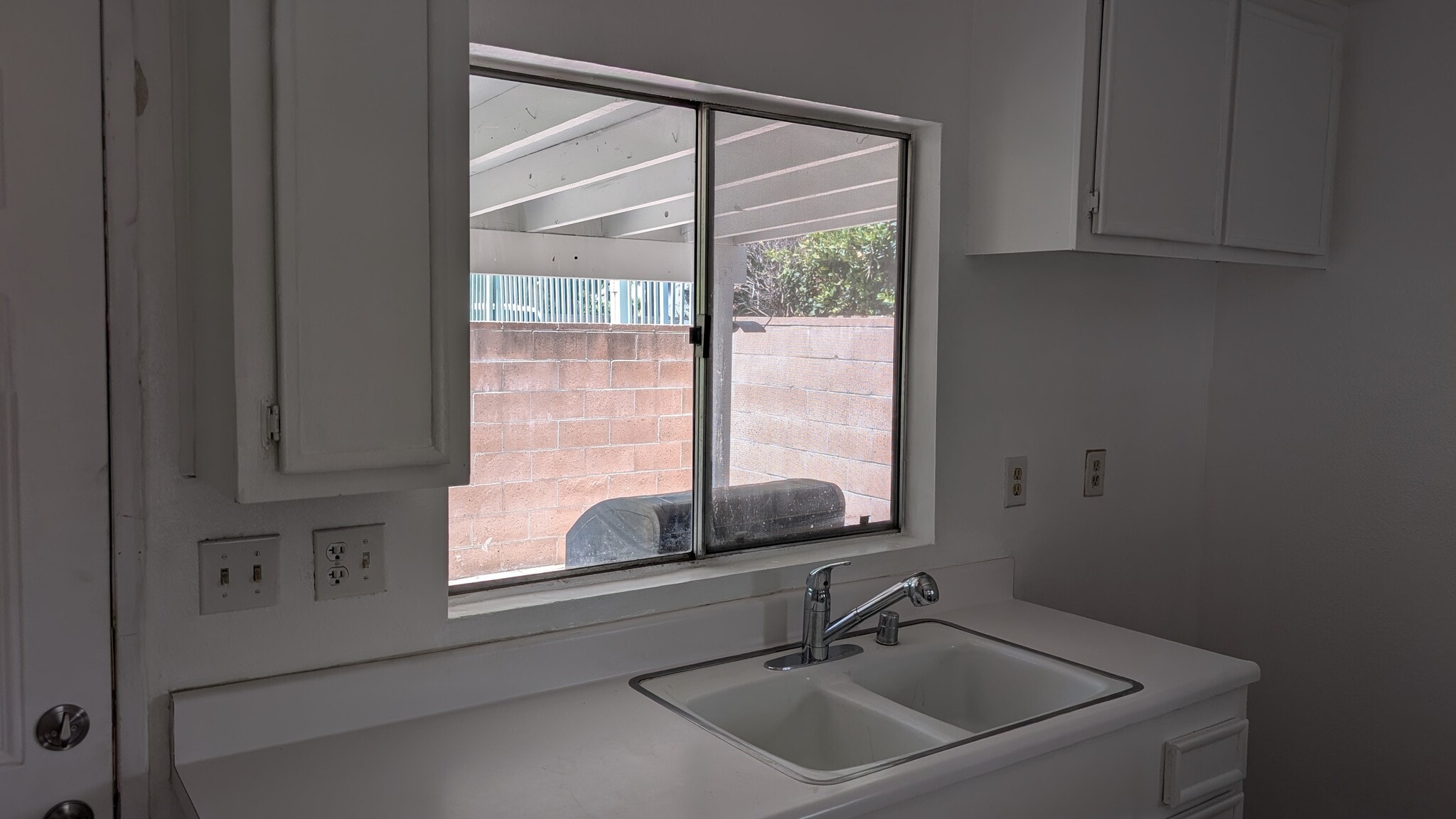 Kitchen Window to back yard - 10125 De Soto Ave