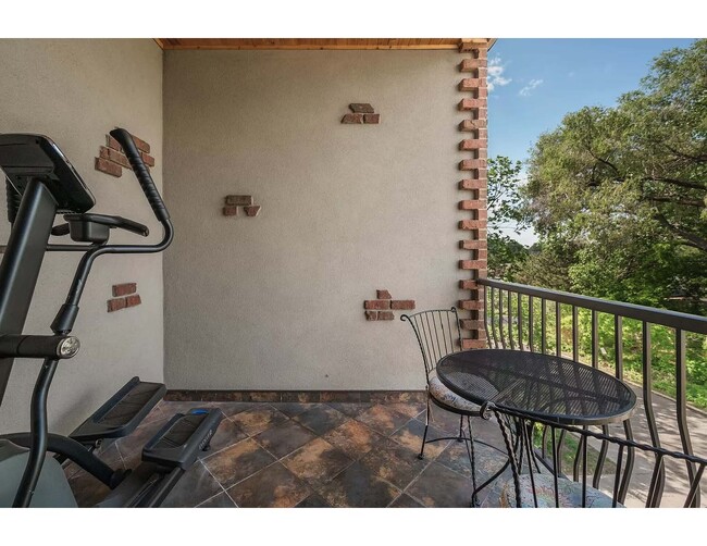 Entrance to west-facing balcony from sliding glass door - 3125 Inglewood Ave S