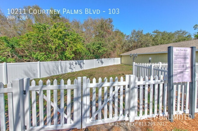 Building Photo - 10211 Courtney Palms Blvd