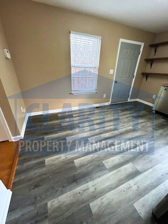 Building Photo - Three bedroom with attached garage!