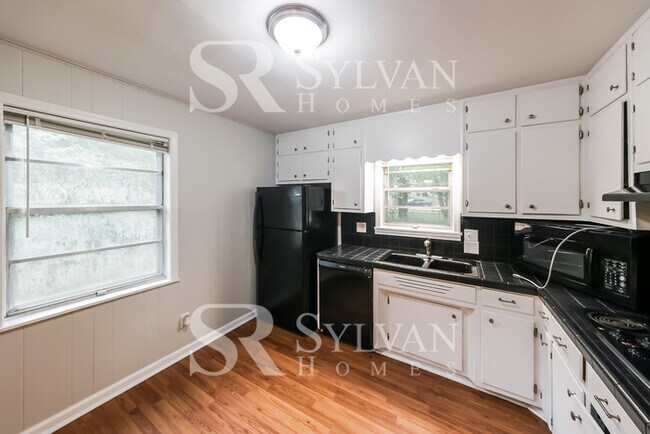 Building Photo - Turn the key. Enter. Smile. Repeat every day!