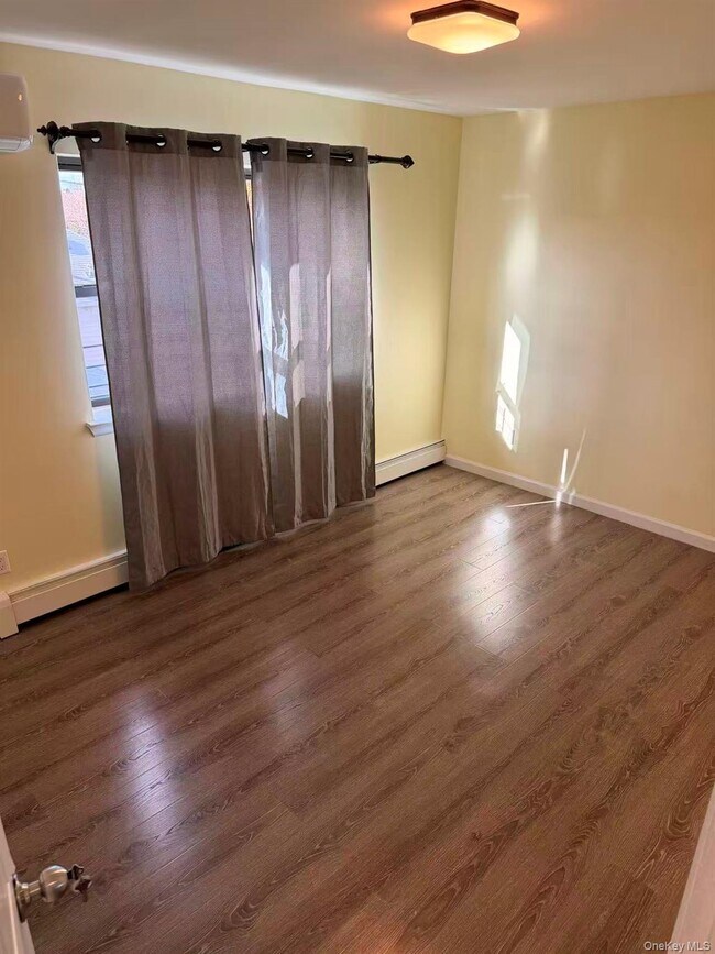 Building Photo - 55-12 Main St