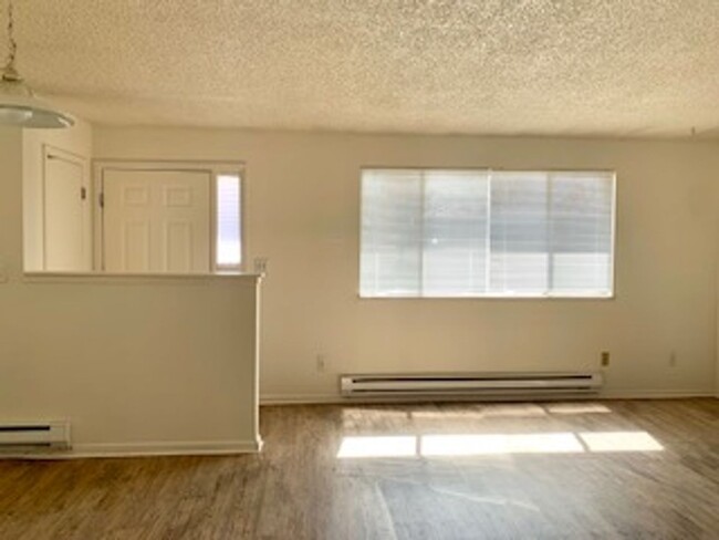 Building Photo - Two Bedroom Condo With  Garage Available F...