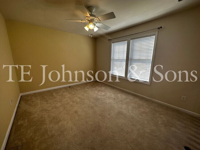 Building Photo - Spacious 3 Bedroom Home with Primary Suite on Main, Gas Fireplace & Patio in Advance!
