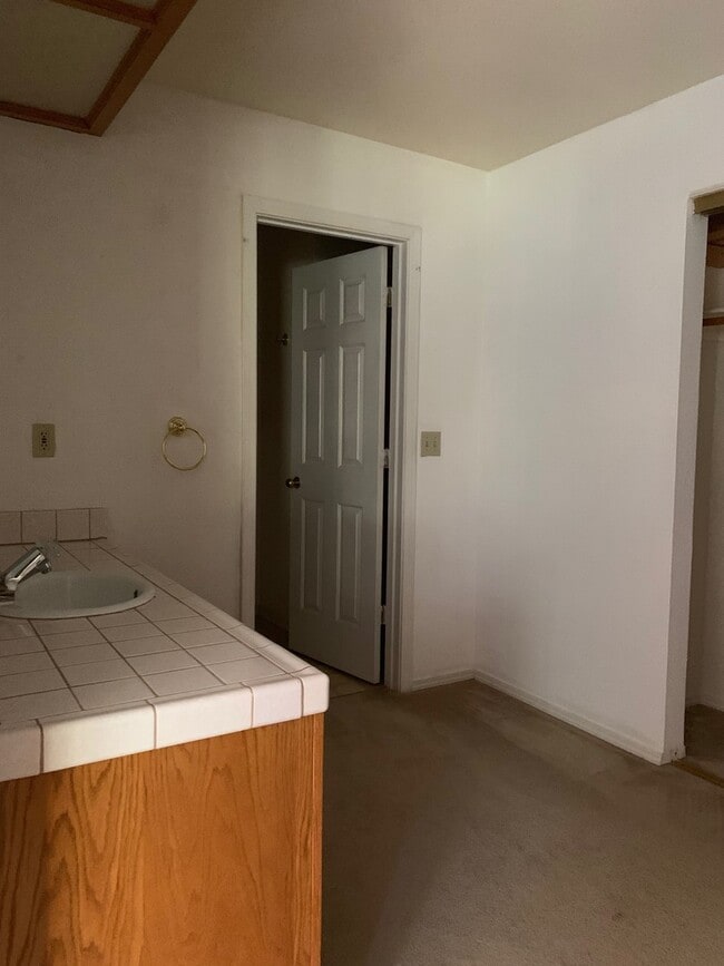 Building Photo - Spacious 3-Bedroom Home with Greenbelt Views & Landscaping Included
