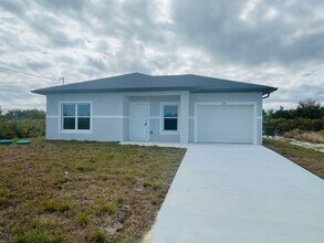 Building Photo - Brand-New Modern 2BR/2BA Home with Garage – Desirable Southwest Lehigh Location