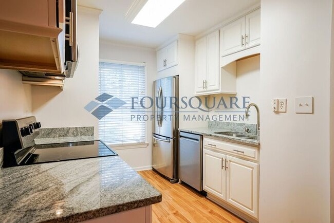 Building Photo - Bright 2-Bed / 2.5-Bath Townhome with Fireplace, Back Deck & Open Living – Convenient to Cary