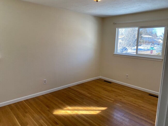 Building Photo - Great corner lot home backing up to open s...