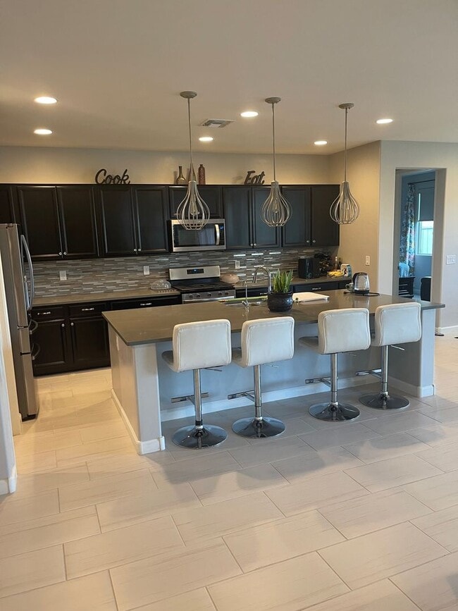 Building Photo - STUNNING NEWER HOME- GATED